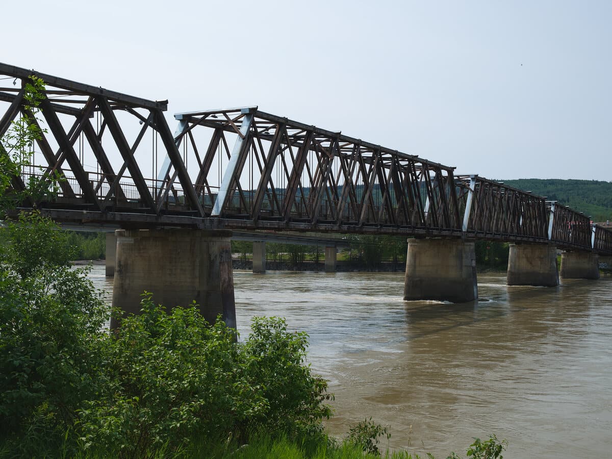 Quesnel's historic Fraser River footbridge, the town's best-known landmark, crossing the river in summer.